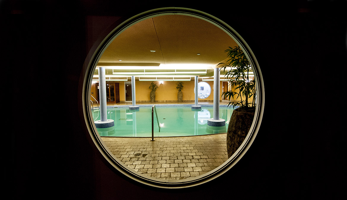 View of pool through circular window