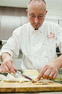 Chef Robert Mills preparing hors d'oeuvres