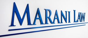 Closeup shot of Marani Law Logo in Reception