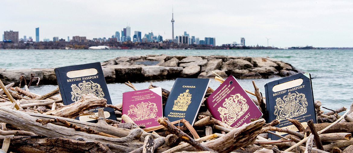 Multiple Passports with CN Tower in the background