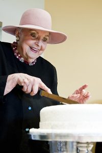 Bettie Bradley Cutting the Cake