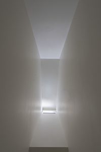 A lightwell is used to illuminate the central portion of both the main and second floors