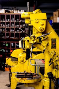 Auto Repair Shop Large Yellow Drill Press