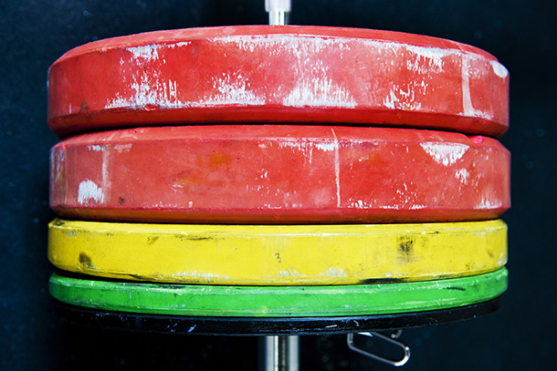 Closeup of red, yellow and green weights