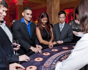 Guests enjoy a game of blackjack