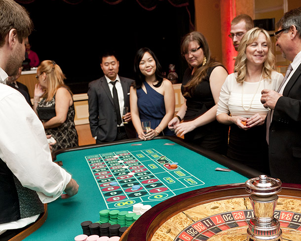 Guests play roulette and smile