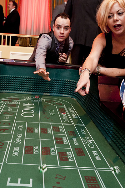 Guests play on the craps table