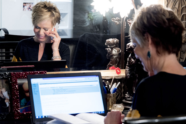 Jane Durst-Pulkys making calls in her office