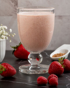 Jane's Strawberry Shake on counder with strawberries